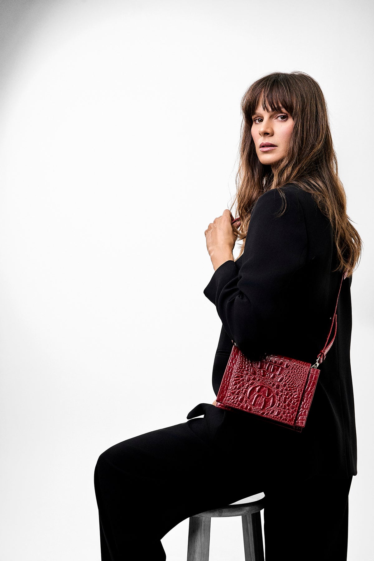 Model wearing the Mini Chevy Bag Burgundy crossbody